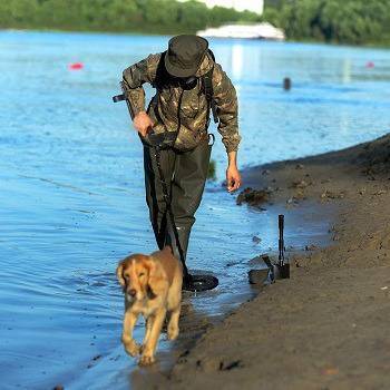 Metal detecting on the beach